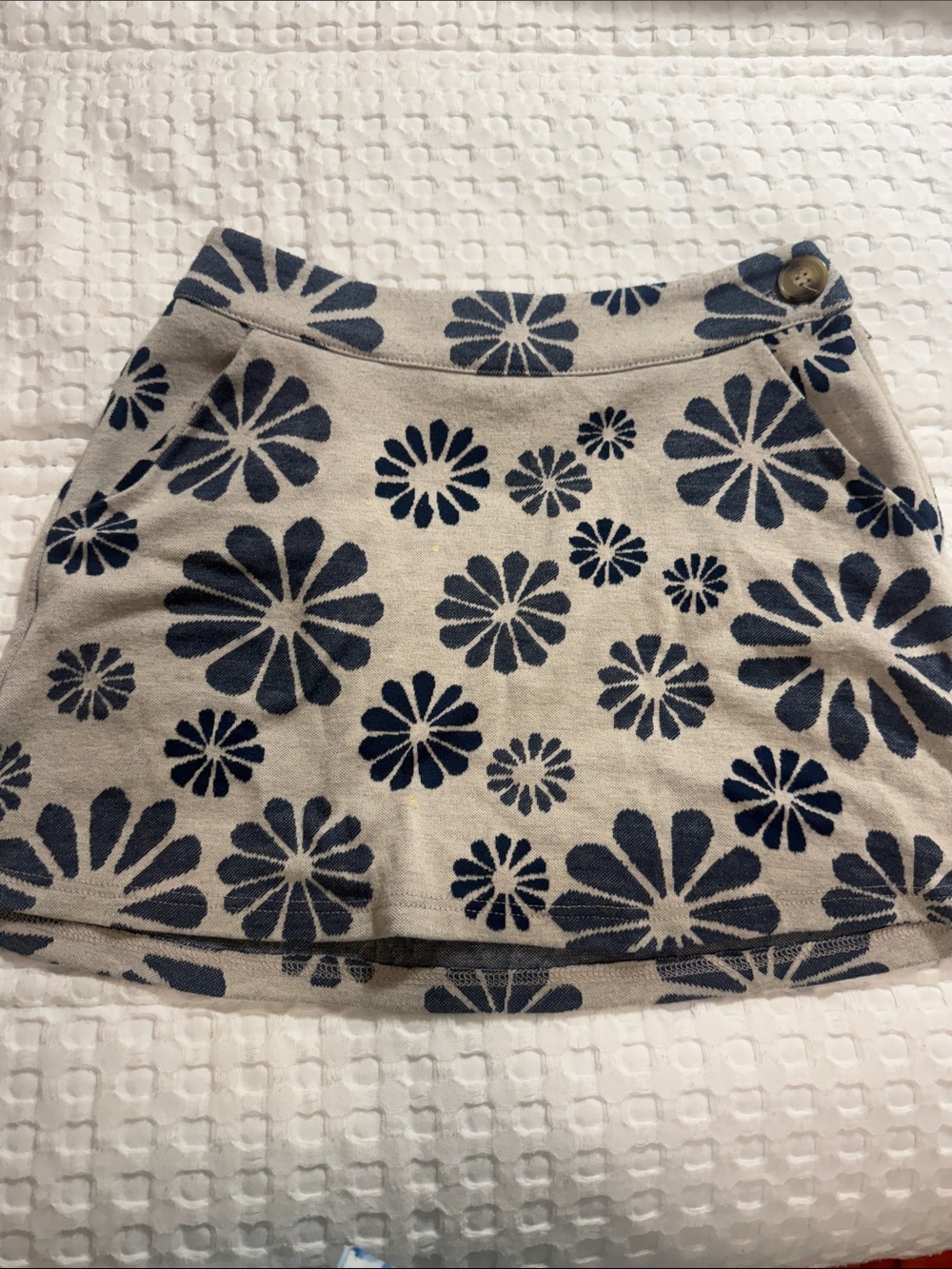 Altar'd State Beige Mini Skirt with Navy Floral Pattern